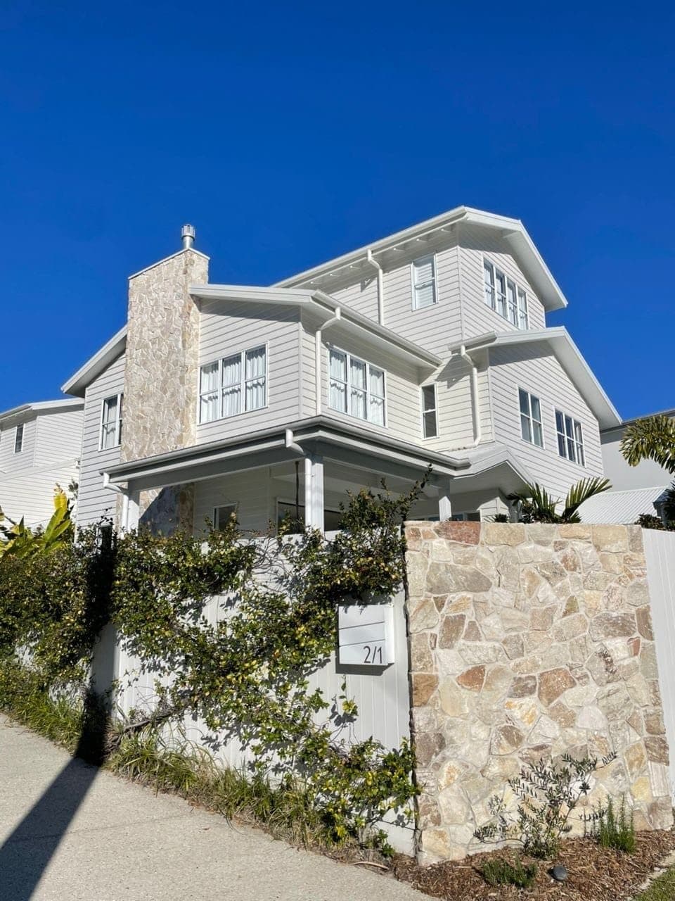 Linen natural stone, three-storey home